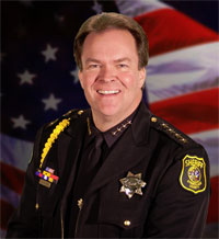 Is Reelection of Sheriff Adam Christiansen a Cakewalk?