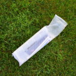 Newspaper in plastic delivery bag