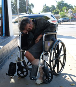 Alan Davis rests in wheelchair