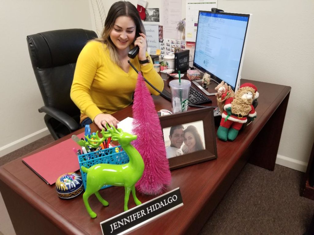 Hidalgo at desk