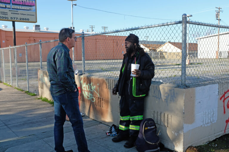 Councilman Nick Bavaro with a homeless man in his district, Modesto, CA
